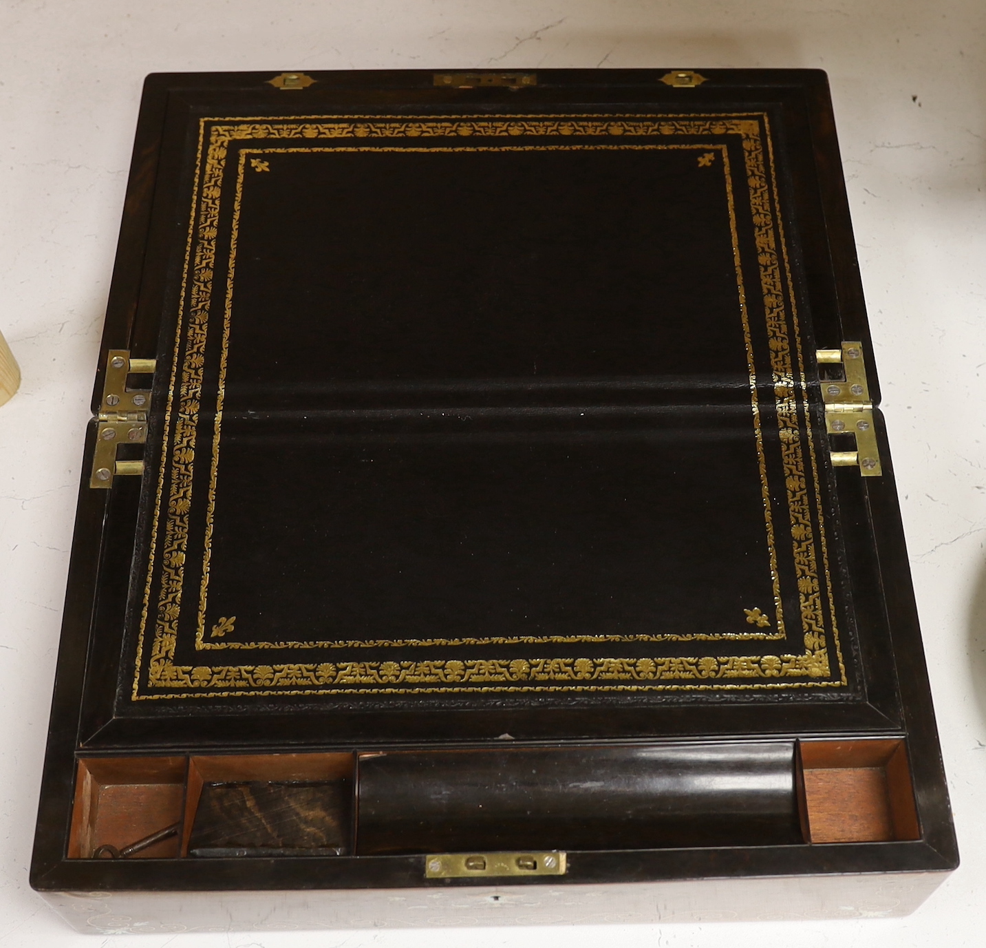 A 19th century brass and mother of pearl inlaid rosewood writing slope, 40cm wide